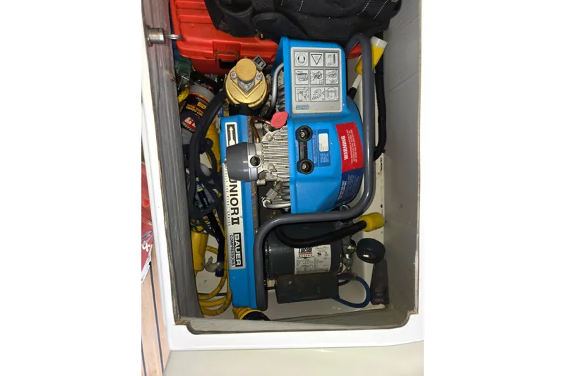 Sol Mates Yacht Photos Pics Bauer Junior II compressor in 2018 Fountaine Pajot SABA 50 yacht compartment.