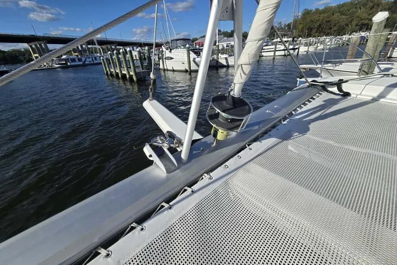 Sol Mates Yacht Photos Pics 2018 Fountaine Pajot SABA 50 catamaran docked at marina, showcasing deck and rigging.