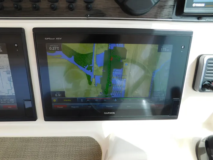 Here & Now Yacht Photos Pics Garmin navigation display on 2018 Grady-White Freedom 375 boat dashboard.