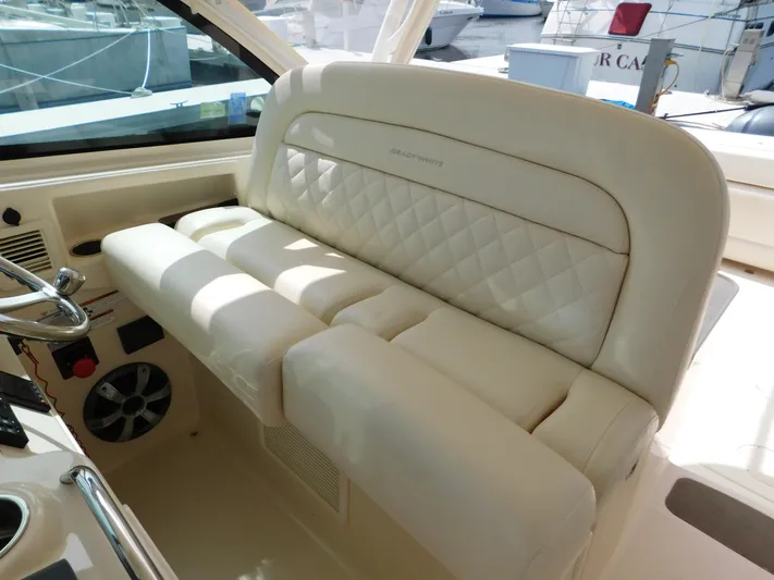 Here & Now Yacht Photos Pics Luxurious seating on 2018 Grady-White Freedom 375 boat, featuring quilted upholstery.