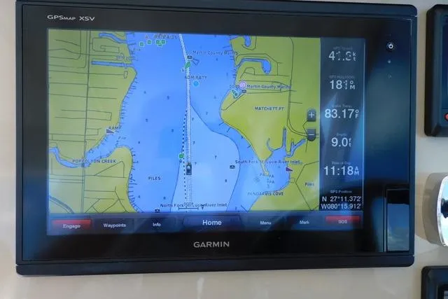  Yacht Photos Pics Garmin GPS display on 2016 Pursuit DC 325 Dual Console, showing nautical map and navigation data.