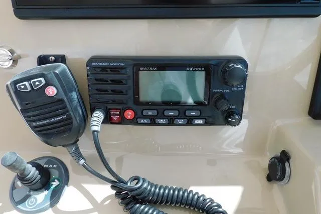  Yacht Photos Pics Control panel of a 2016 Pursuit DC 325 Dual Console with radio and microphone.