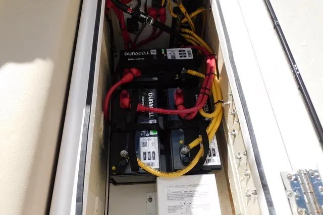  Yacht Photos Pics Battery compartment of a 2016 Pursuit DC 325 Dual Console boat with Duracell batteries.