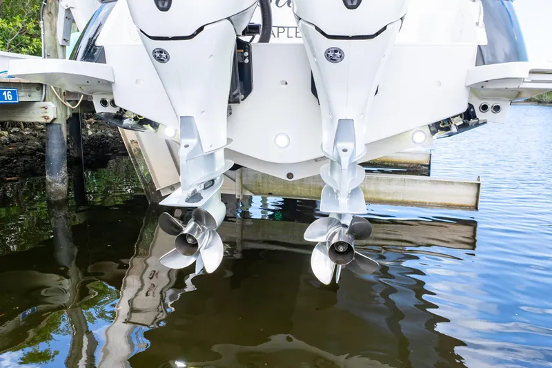  Yacht Photos Pics 2023 Intrepid 345 Valor boat engines and propellers above water.