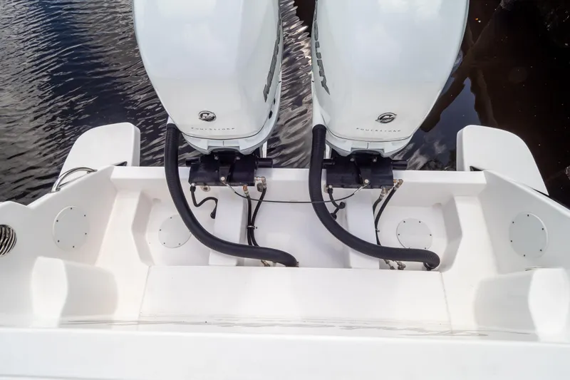  Yacht Photos Pics 2023 Intrepid 345 Valor boat with dual outboard engines on water.