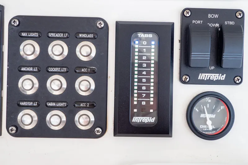  Yacht Photos Pics Control panel of 2023 Intrepid 345 Valor boat with switches and gauges.