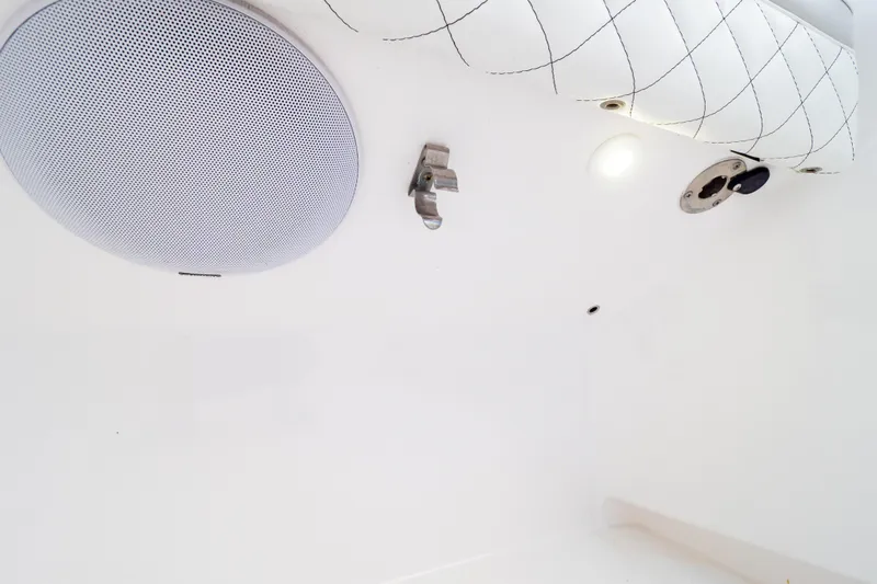  Yacht Photos Pics 2023 Intrepid 345 Valor interior ceiling with speaker and light fixtures.