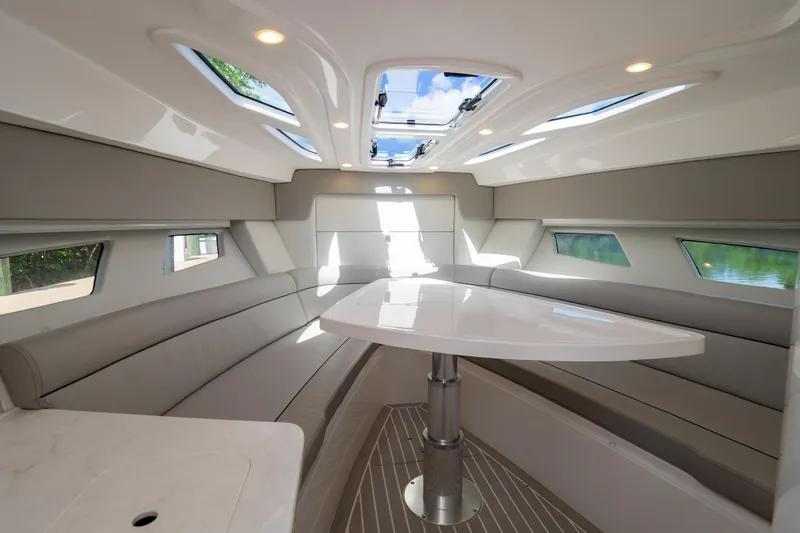  Yacht Photos Pics Interior of 2023 Intrepid 345 Valor boat with sleek seating and modern design.