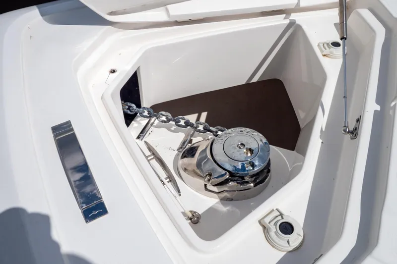  Yacht Photos Pics Anchor compartment of 2023 Intrepid 345 Valor boat with chain and winch.