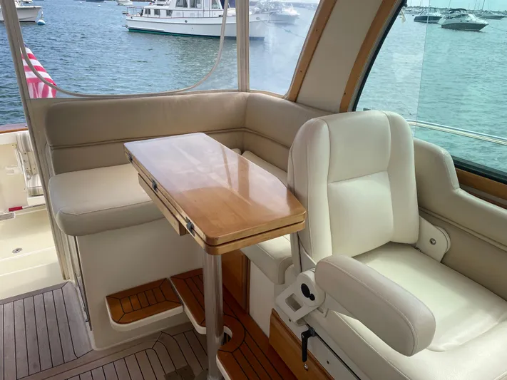 Tess Yacht Photos Pics Helm deck L-shaped sofa & table