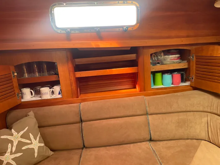 Tess Yacht Photos Pics Storage behind sofa