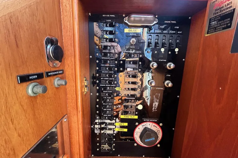 Radius Yacht Photos Pics Control panel of a 1986 Grand Banks 42 Classic yacht, featuring various switches and dials.