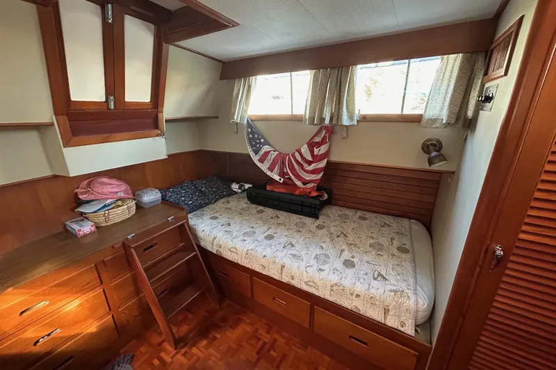 Radius Yacht Photos Pics Cozy cabin interior of 1986 Grand Banks 42 Classic yacht with wooden furnishings.
