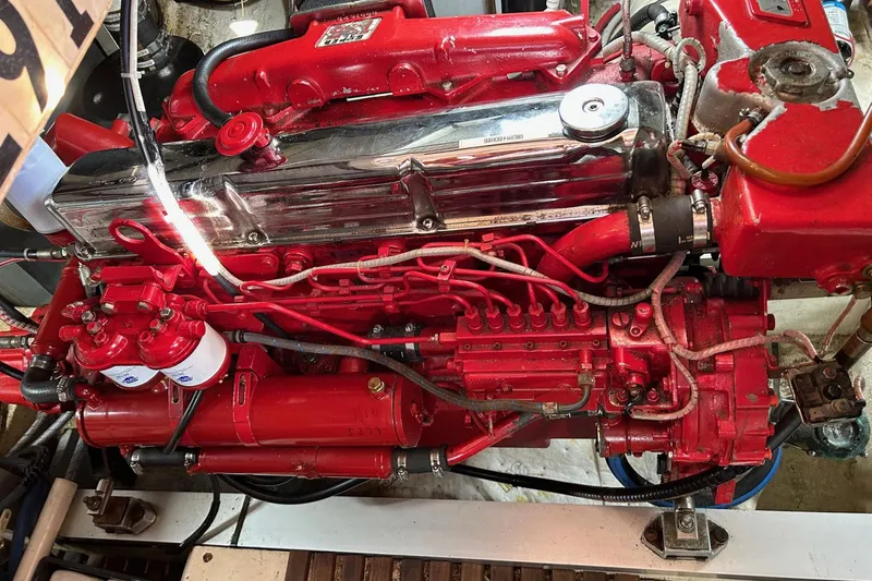 Radius Yacht Photos Pics Engine of a 1986 Grand Banks 42 Classic, featuring red components and intricate wiring.