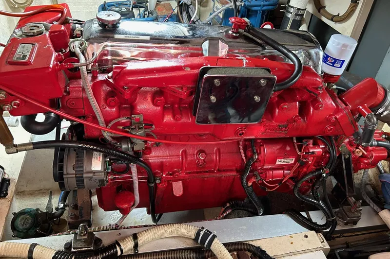 Radius Yacht Photos Pics Red engine of a 1986 Grand Banks 42 Classic boat, detailed view.