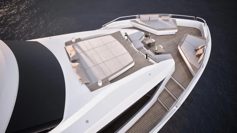 L88 Yacht Photos Pics Luxurious 2026 Ladenstein L88 Co-Ownership yacht deck with elegant seating and sunbathing area.