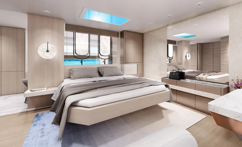 L88 Yacht Photos Pics Luxurious bedroom interior of 2026 Ladenstein L88 Co-Ownership yacht, featuring modern design and ocean view.