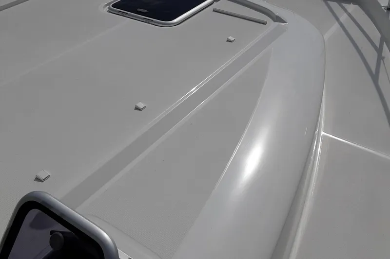  Yacht Photos Pics 2014 Beneteau Swift Trawler 34 deck, showcasing sleek design and smooth surface.