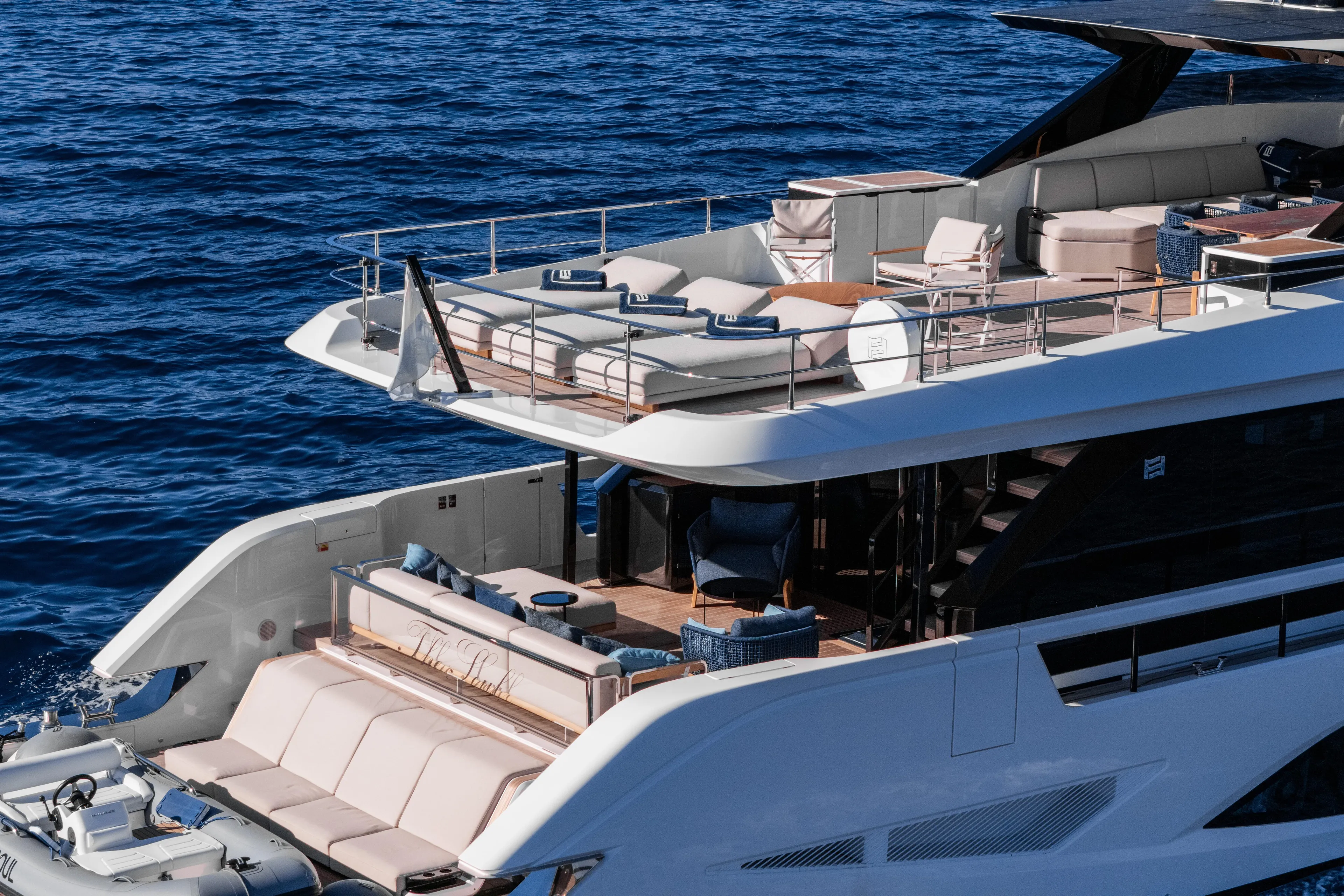  Yacht Photos Pics Luxurious 2025 Ferretti Yachts INFYNITO 80 cruising on open sea, showcasing elegant design.