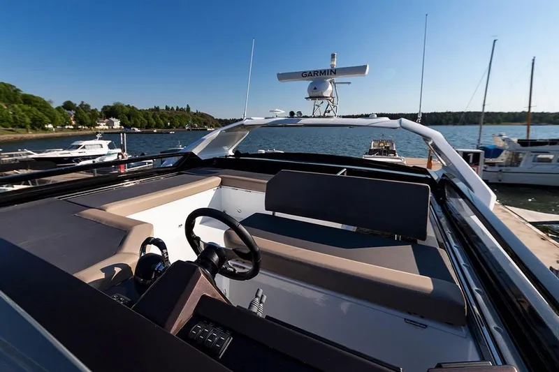 Dream Yacht Photos Pics Manufacturer Provided Image: 2019 Galeon 470 Sky yacht with Garmin radar, docked at a marina.