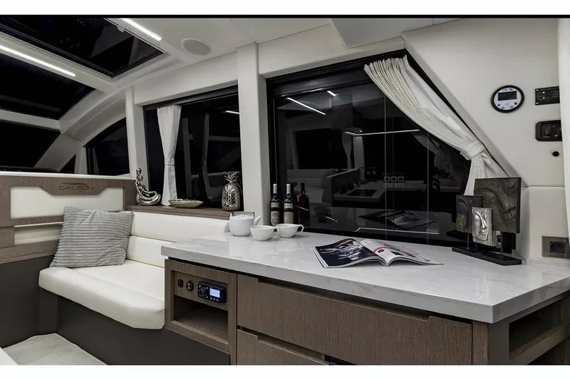 Dream Yacht Photos Pics Manufacturer Provided Image: Interior of 2019 Galeon 470 Sky yacht with modern decor and comfortable seating.