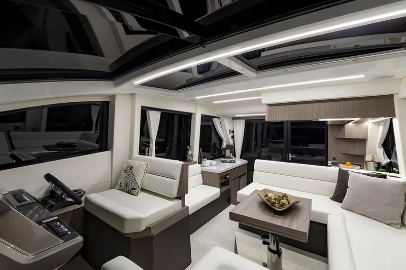Dream Yacht Photos Pics Manufacturer Provided Image: Luxurious interior of 2019 Galeon 470 Sky yacht with modern seating and sleek design.