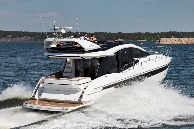 Dream Yacht Photos Pics Manufacturer Provided Image: 2019 Galeon 470 Sky yacht cruising on open water.