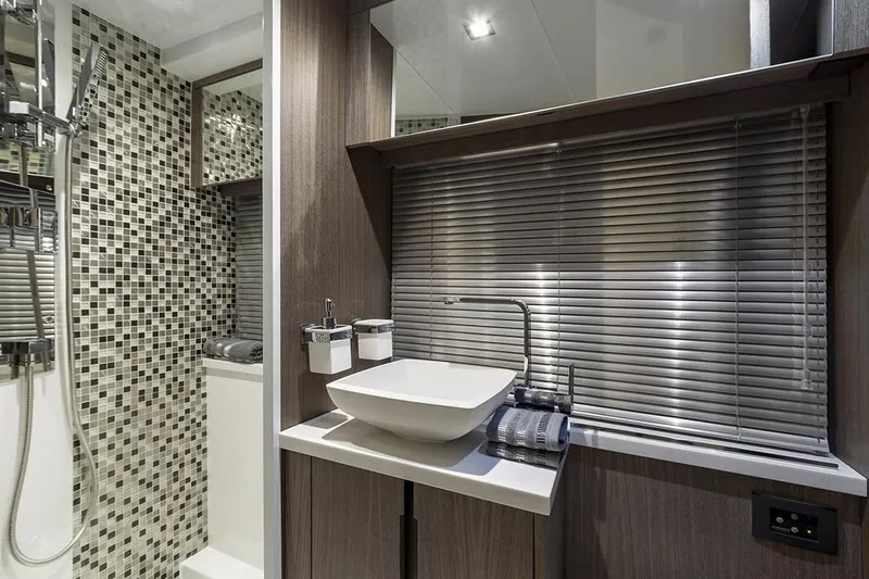 Dream Yacht Photos Pics Manufacturer Provided Image: Modern bathroom in 2019 Galeon 470 Sky yacht with vessel sink and mosaic tiles.