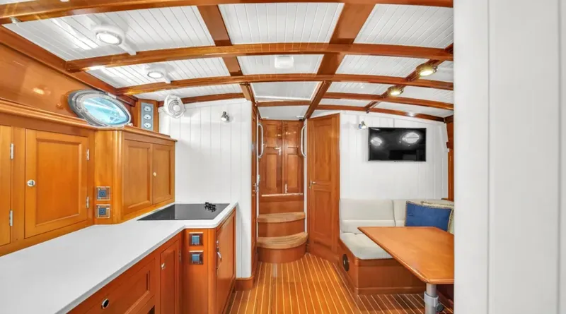 Noi Qauttro Yacht Photos Pics Luxurious 2010 custom gentleman's motor yacht interior with wood finish and modern amenities.