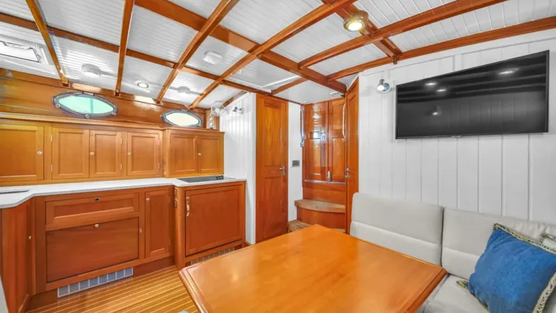 Noi Qauttro Yacht Photos Pics Luxurious 2010 custom gentleman's motor yacht interior with wood paneling and modern amenities.