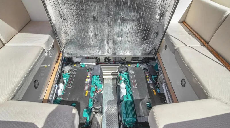 Noi Qauttro Yacht Photos Pics Engine compartment of a 2010 Custom Gentleman's Motor Yacht, showcasing dual engines.