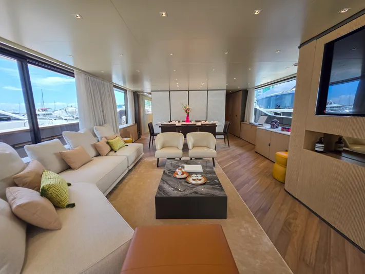  Yacht Photos Pics Luxurious interior of 2025 Sanlorenzo SD90 yacht with elegant seating and modern decor.