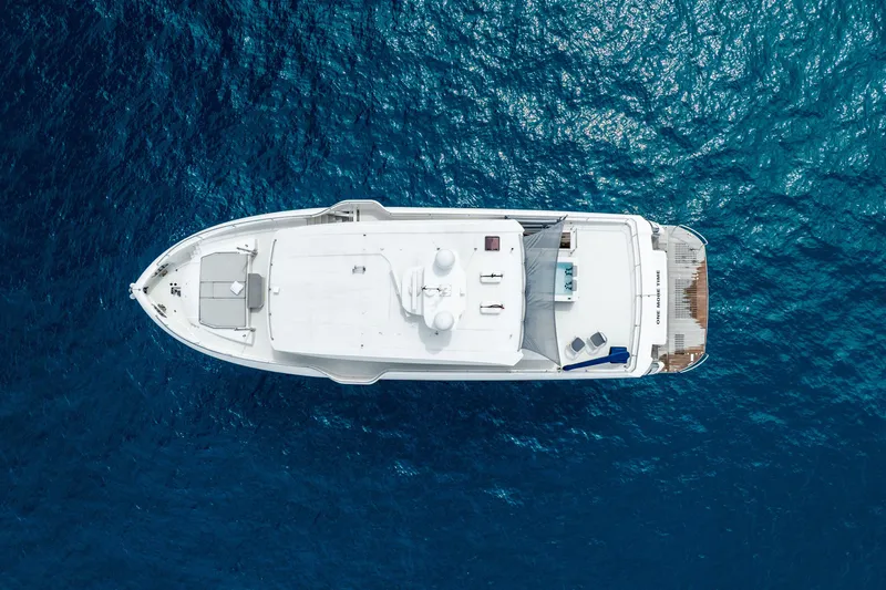 One More Time Yacht Photos Pics Aerial view of 2020 Horizon FD80 yacht on deep blue ocean water.