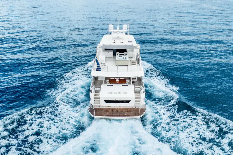 One More Time Yacht Photos Pics Aerial view of 2020 Horizon FD80 yacht cruising on open sea.