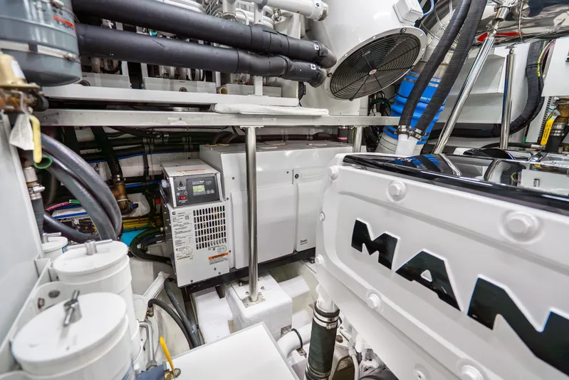 One More Time Yacht Photos Pics Engine room of 2020 Horizon FD80 yacht with MAN engine and Cummins generator.