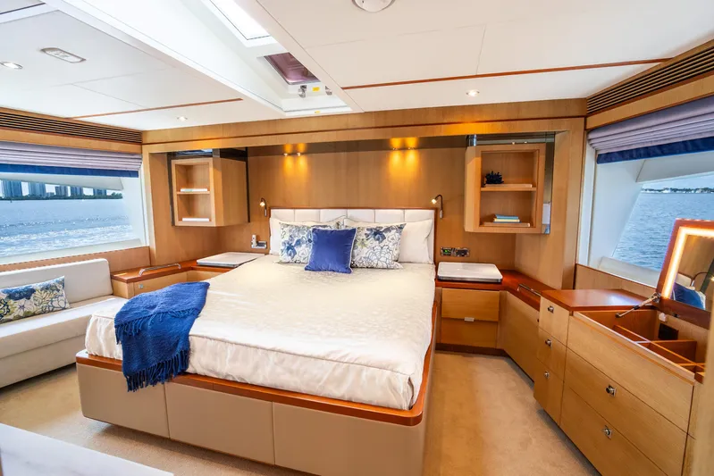One More Time Yacht Photos Pics Luxurious 2020 Horizon FD80 yacht bedroom with elegant wood finishes and ocean view.