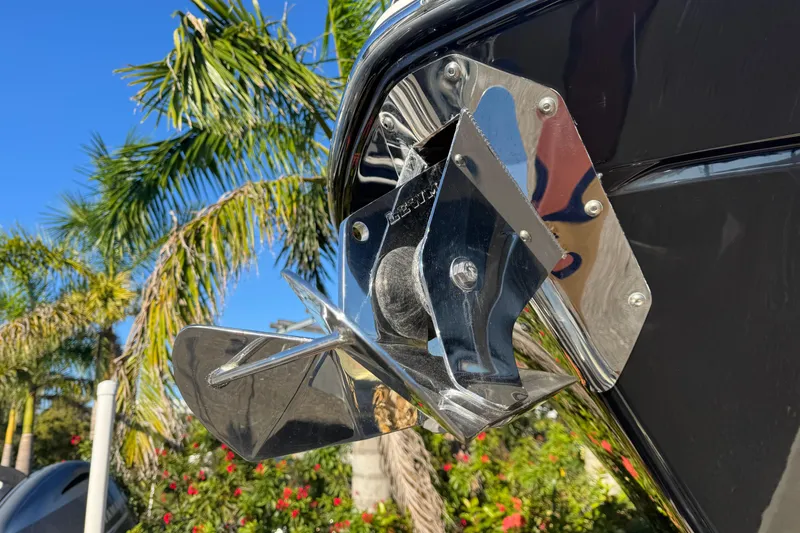  Yacht Photos Pics Close-up of 2021 Blackfin 272 CC boat anchor with tropical background.