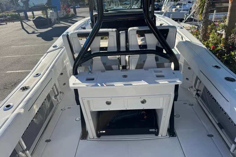  Yacht Photos Pics 2021 Blackfin 272 CC boat interior with seating and storage compartments.