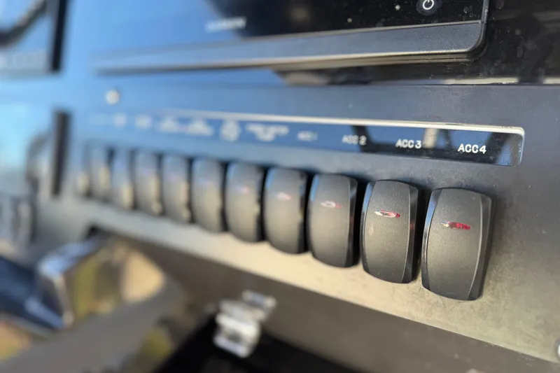  Yacht Photos Pics Close-up of 2021 Blackfin 272 CC boat control panel switches.