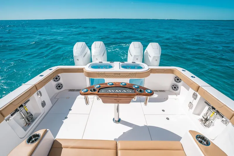  Yacht Photos Pics 2025 Caymas 44 CT boat with luxurious deck and ocean backdrop.