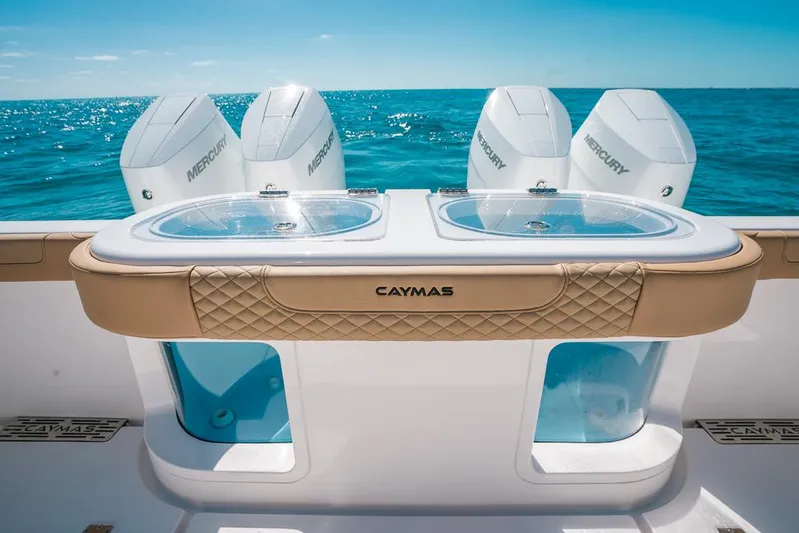  Yacht Photos Pics 2025 Caymas 44 CT boat with Mercury engines on open sea.