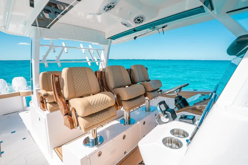  Yacht Photos Pics Luxury seating on 2025 Caymas 44 CT boat with ocean view.