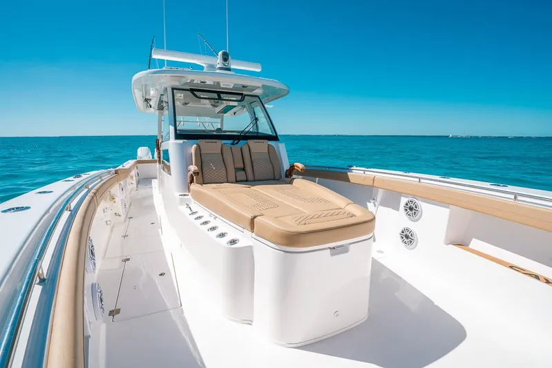  Yacht Photos Pics 2025 Caymas 44 CT boat with luxurious seating on open water.