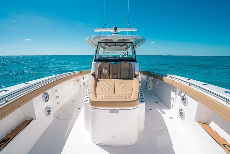  Yacht Photos Pics 2025 Caymas 44 CT boat on open sea, featuring spacious deck and luxurious seating.