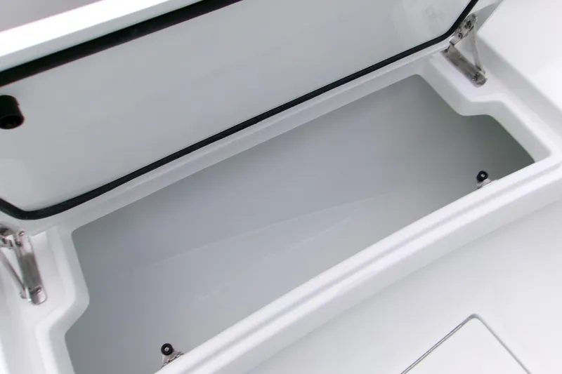  Yacht Photos Pics Open storage compartment on 2026 Contender 28 Tournament boat, showcasing interior space.