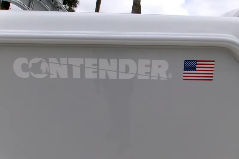  Yacht Photos Pics Contender 28 Tournament 2026 boat with American flag decal on white surface.