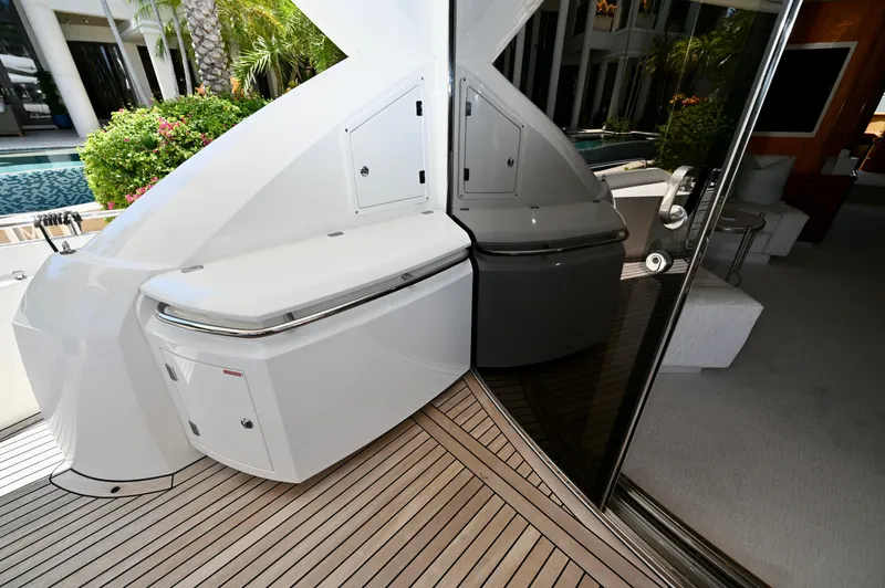 "bella" Yacht Photos Pics Luxurious Sunseeker 82 Yacht 2005 deck with sleek design and modern amenities.