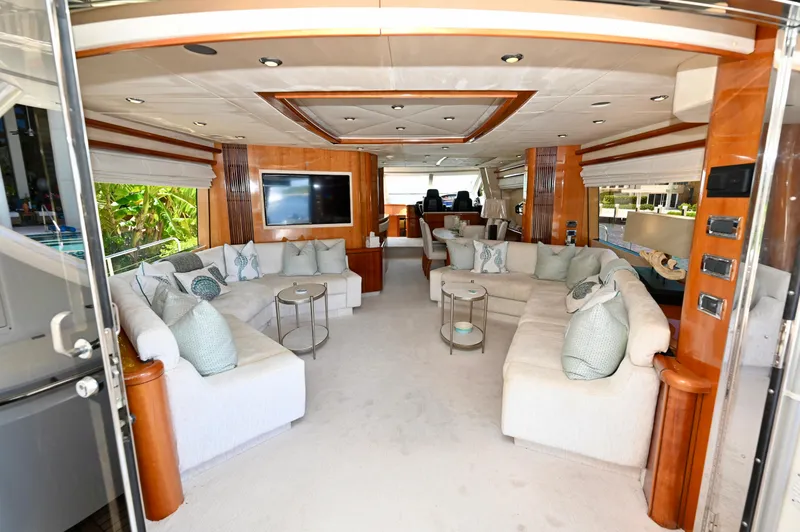 "bella" Yacht Photos Pics Luxurious interior of 2005 Sunseeker 82 Yacht with plush seating and modern decor.