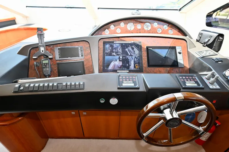 "bella" Yacht Photos Pics Control panel of a 2005 Sunseeker 82 Yacht with advanced navigation systems.