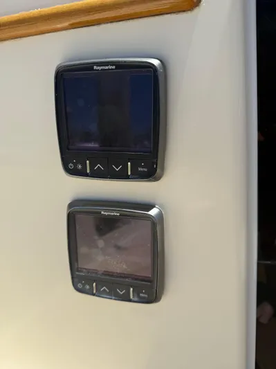 Bolero Yacht Photos Pics Boat control panels on a 2012 Morris M29, featuring Raymarine displays.